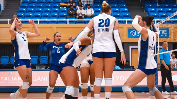 The Seton Hall volleyball team celebrates a point during its victory over Iona on Sept. 5.