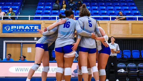 Seton Hall volleyball team huddles after a point during its match against NJIT on Sept. 6.