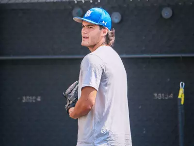 Derek Benzinger starting to pitch