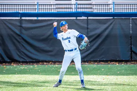 Justin Ford throwing from outfield
