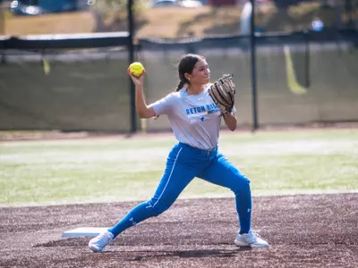 Loreale Blake throwing from second to first