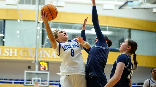 Zahara Bishop shoots over a pair of Villanova players on Feb. 26