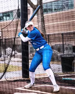 Gabby Mercado hitting in cage