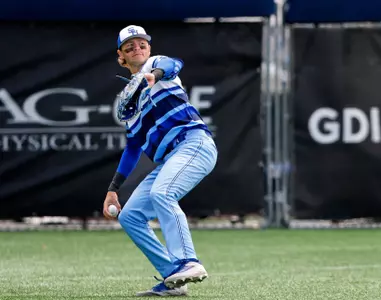 Justin Ford throwing from outfield