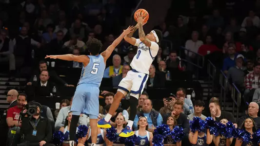 Budd Clark shoots over Creighton at Madison Square Garden