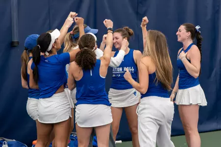 Tennis Team Huddle