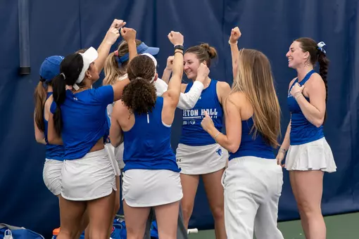 Tennis Team Huddle