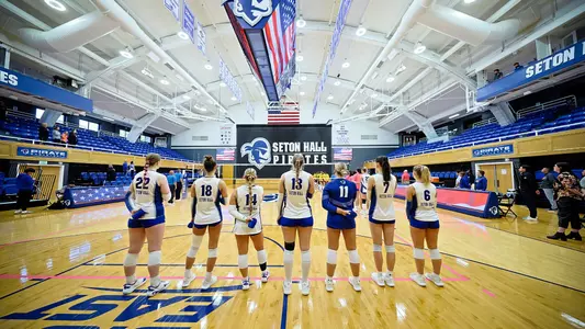 Volleyball lines up for the national anthem