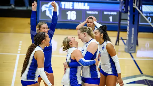 Members of the Seton Hall volleyball team celebrate after a point against Illinois State on Aug. 28.