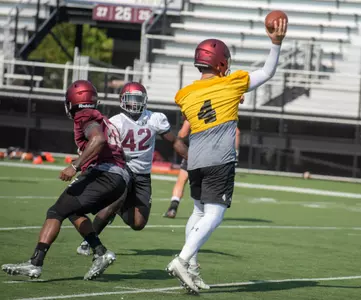 Sam Straub (#4), D.J. Hampton (#27), Withney Simon (#42)