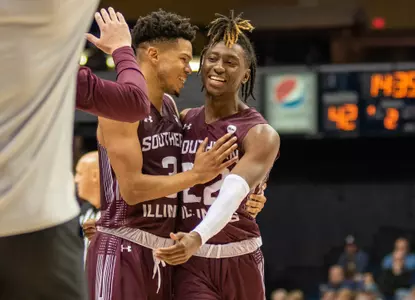 Ronnie Suggs Jr. (3), Harwin Francois (22)