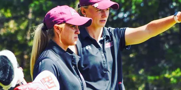 Coach Danielle Kaufman coaches Saluki senior Erica Kerr