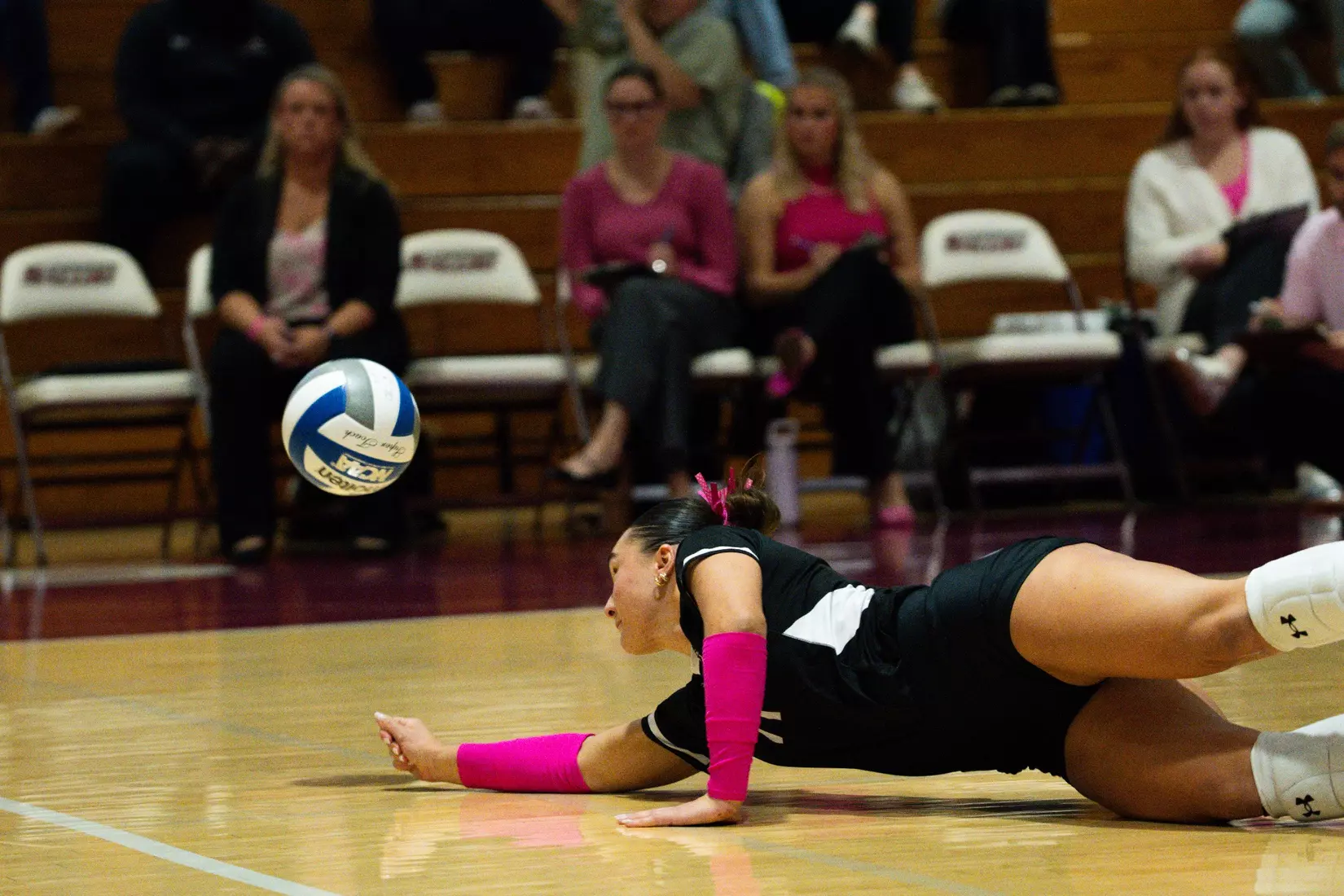 Jillian Shaneyfelt lays out for a dig.
