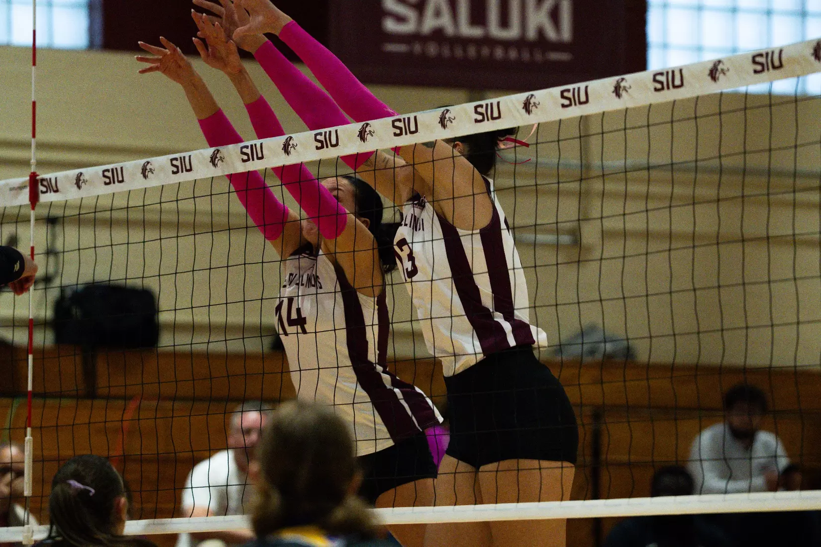 Ella Swansiger and Beatriz Piaia go up for a block.