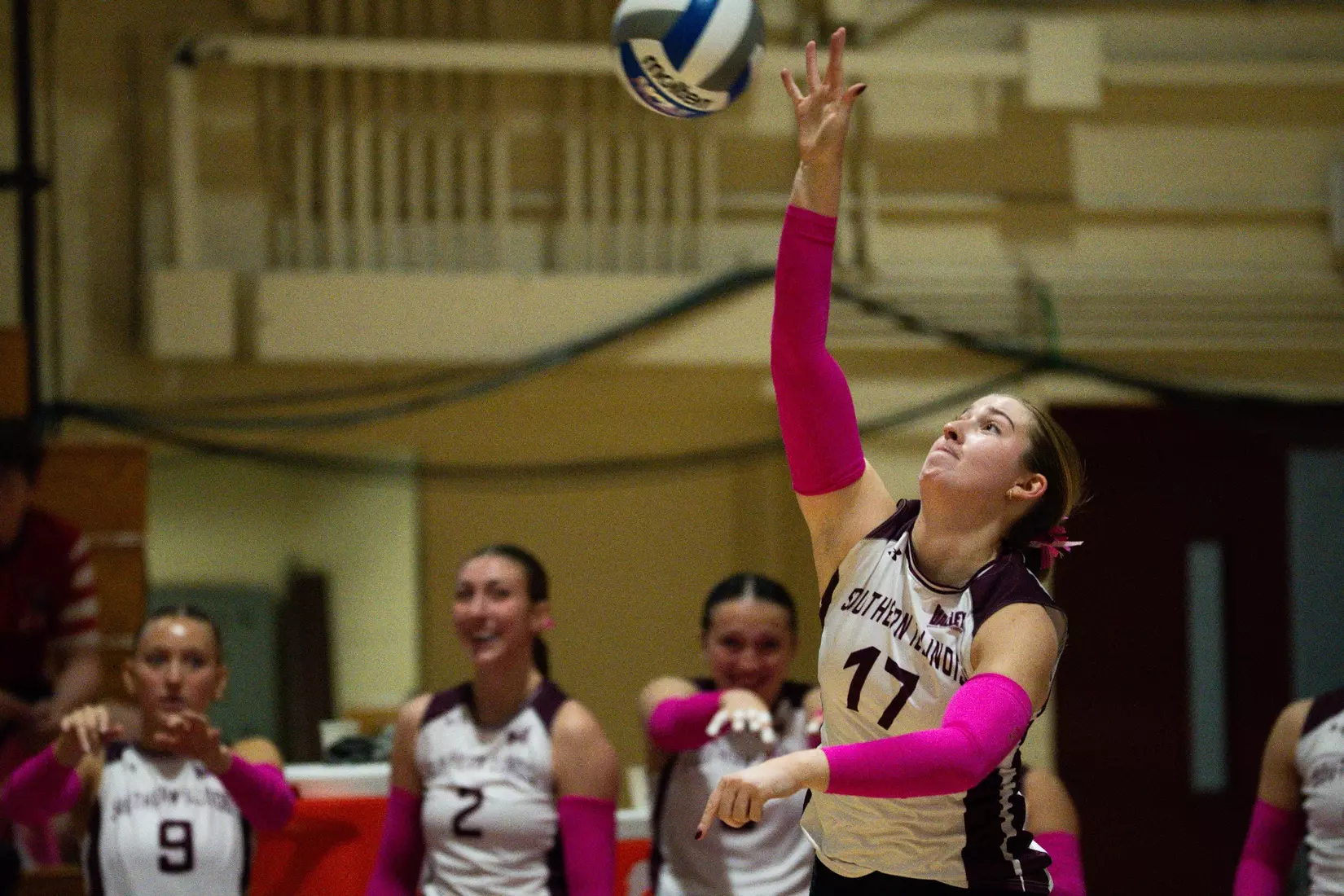 Julia Laidig serves a ball.