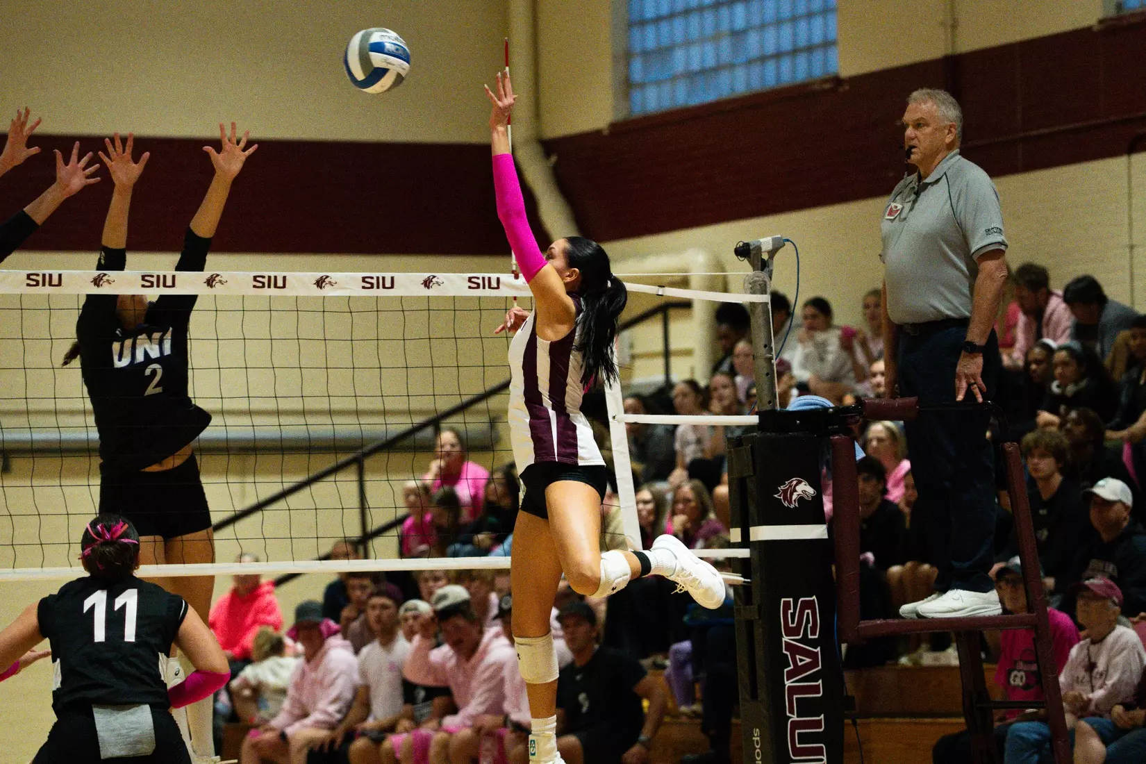 Ella Swansiger attacks a ball.