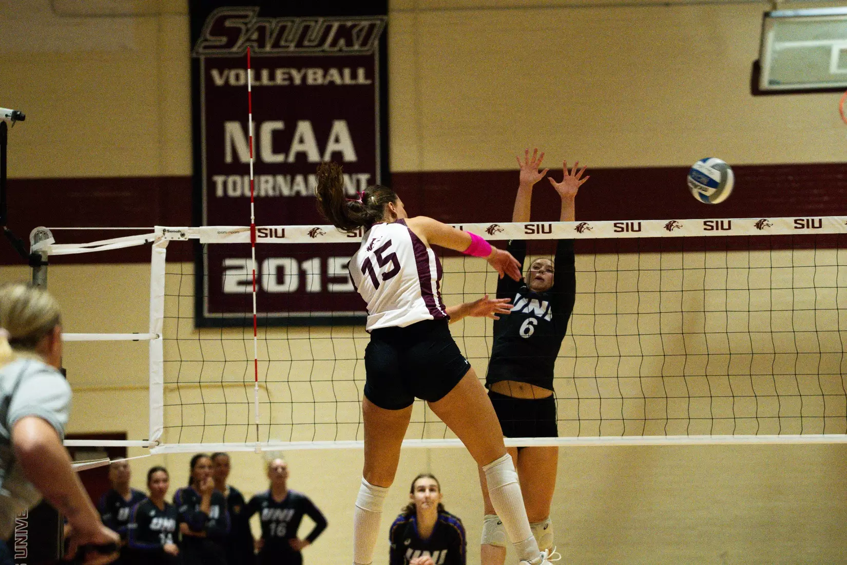 Ida Almkvist attacks a ball.