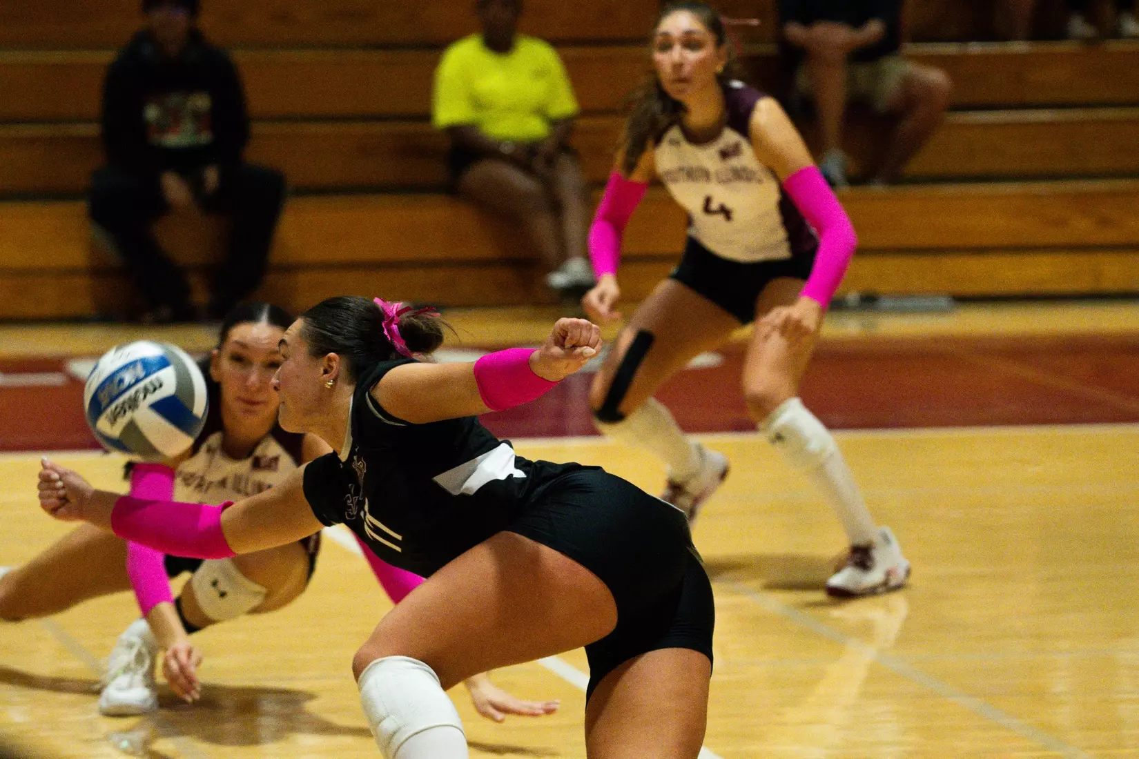 Jillian Shaneyfelt lunges for a ball.