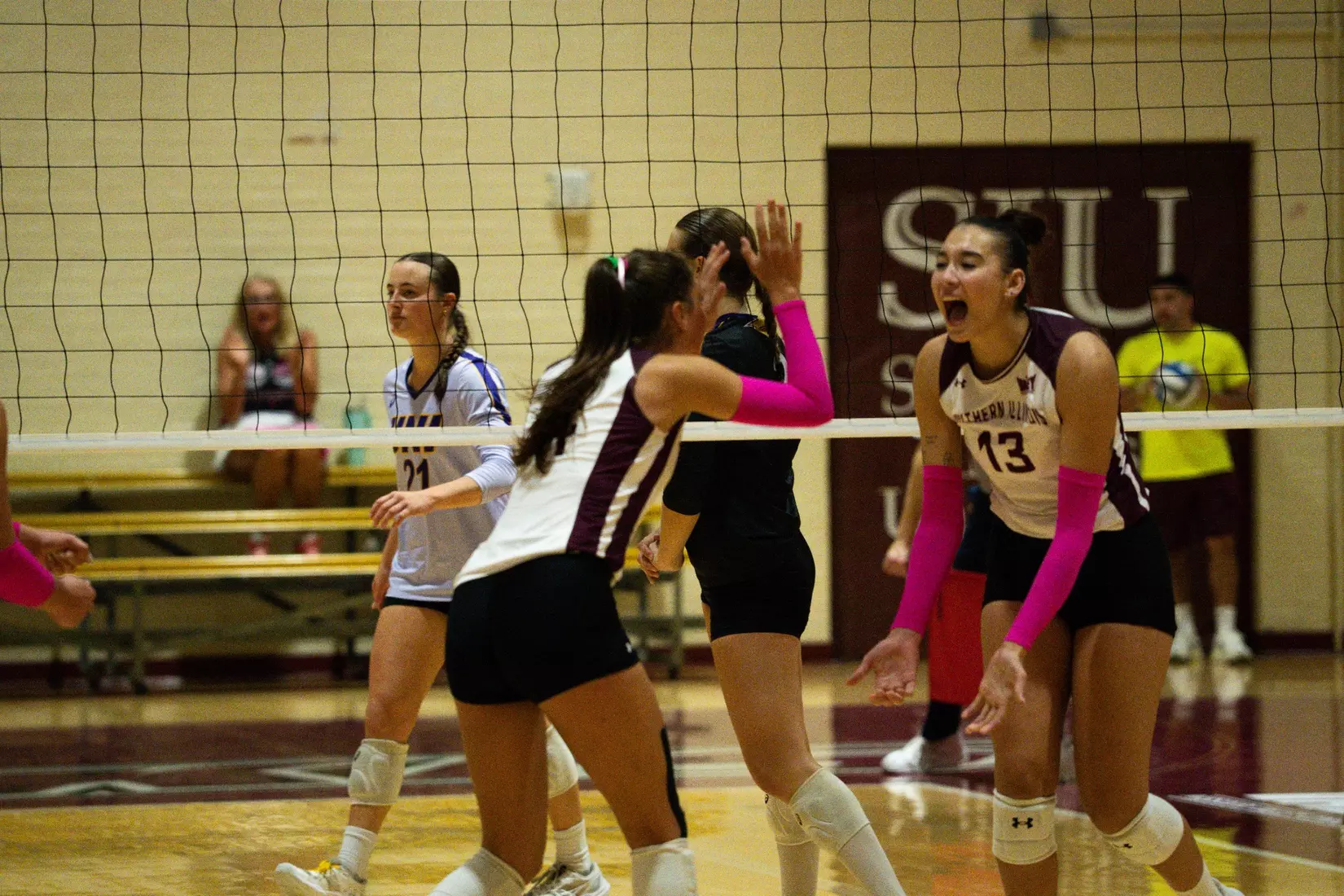 Ella McFarland and Beatriz Piaia celebrate after a point.