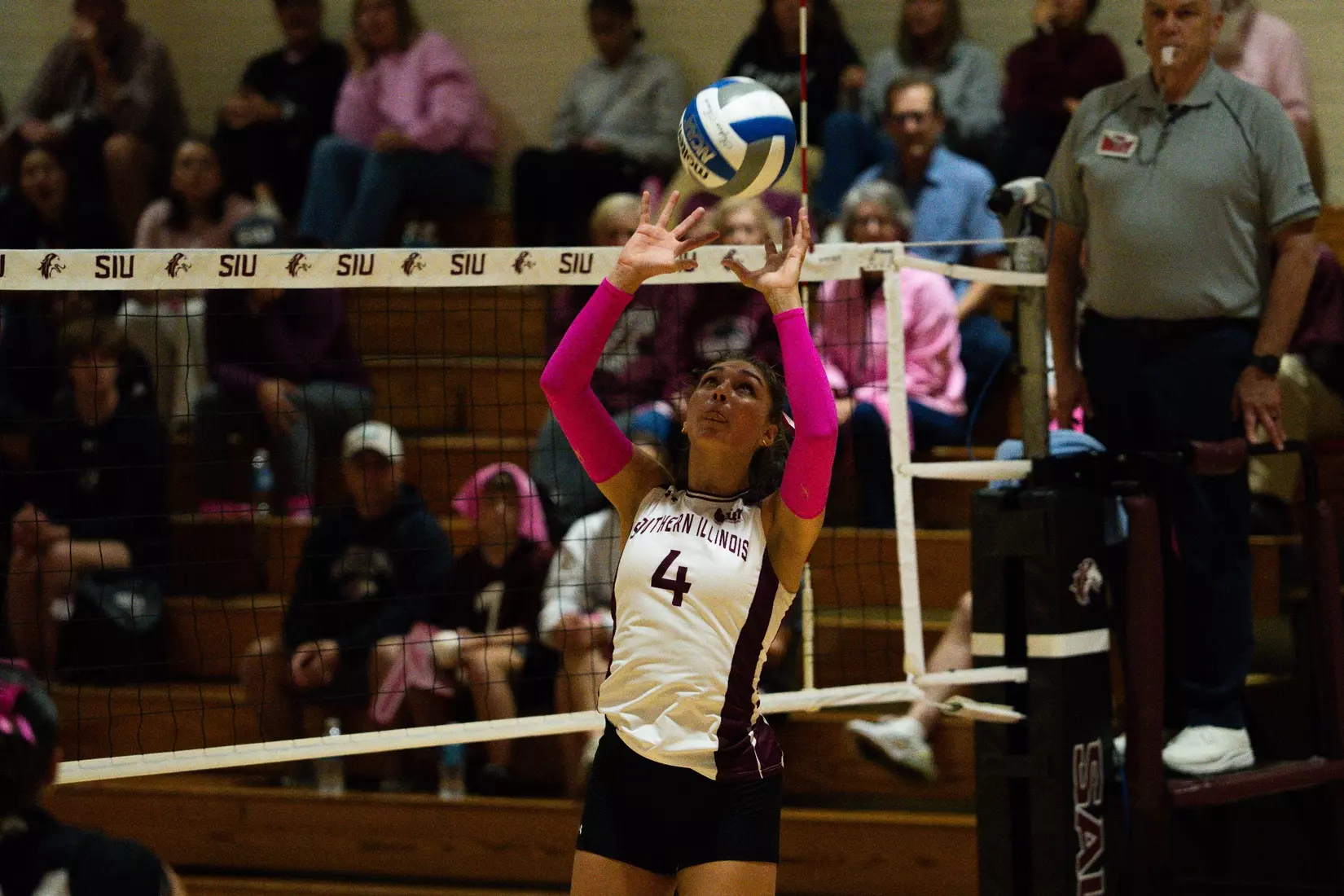 Ella McFarland sets a ball.