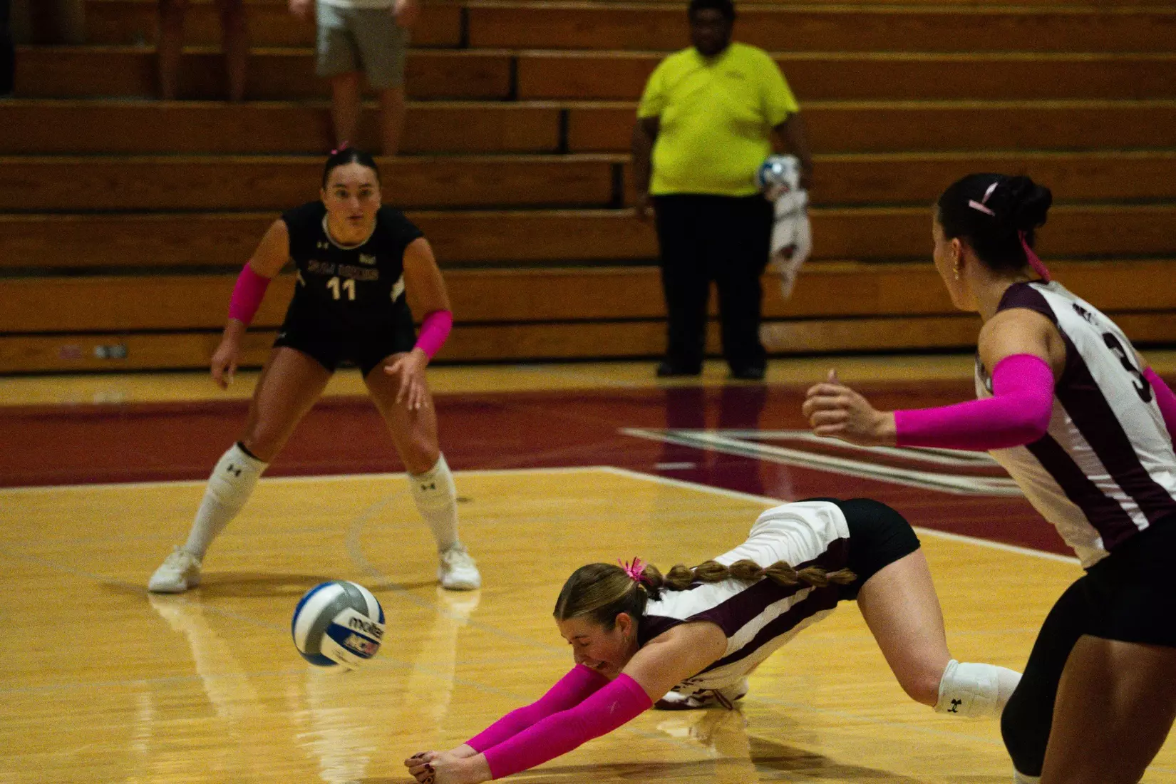 Julia Laidig dives for a ball.