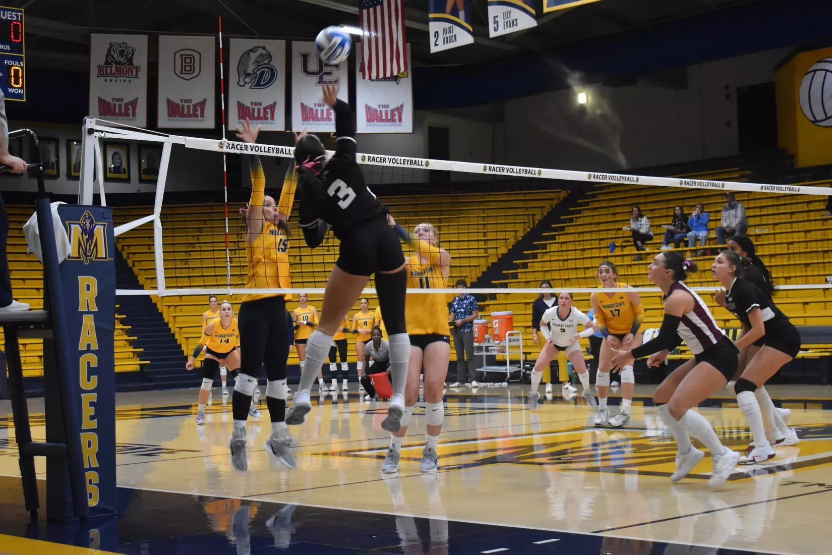 McKenzie Moeller attacks a ball.