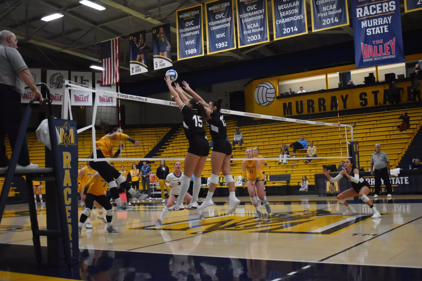 Ida Almkvist and Beatriz Piaia block a ball.