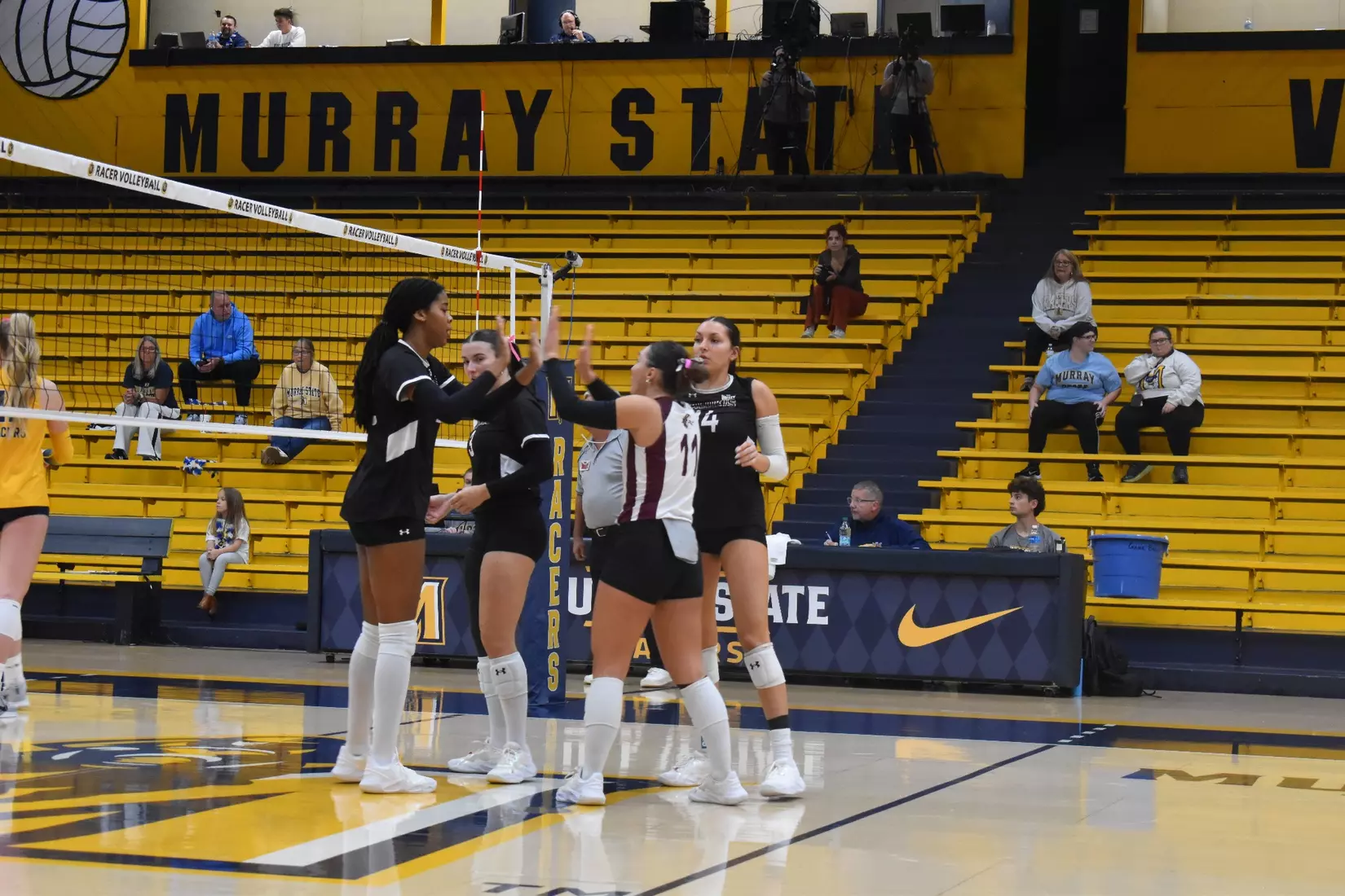 The team celebrates after a point.
