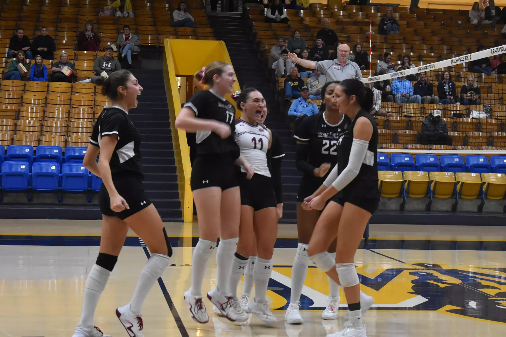 The team celebrates after a point.