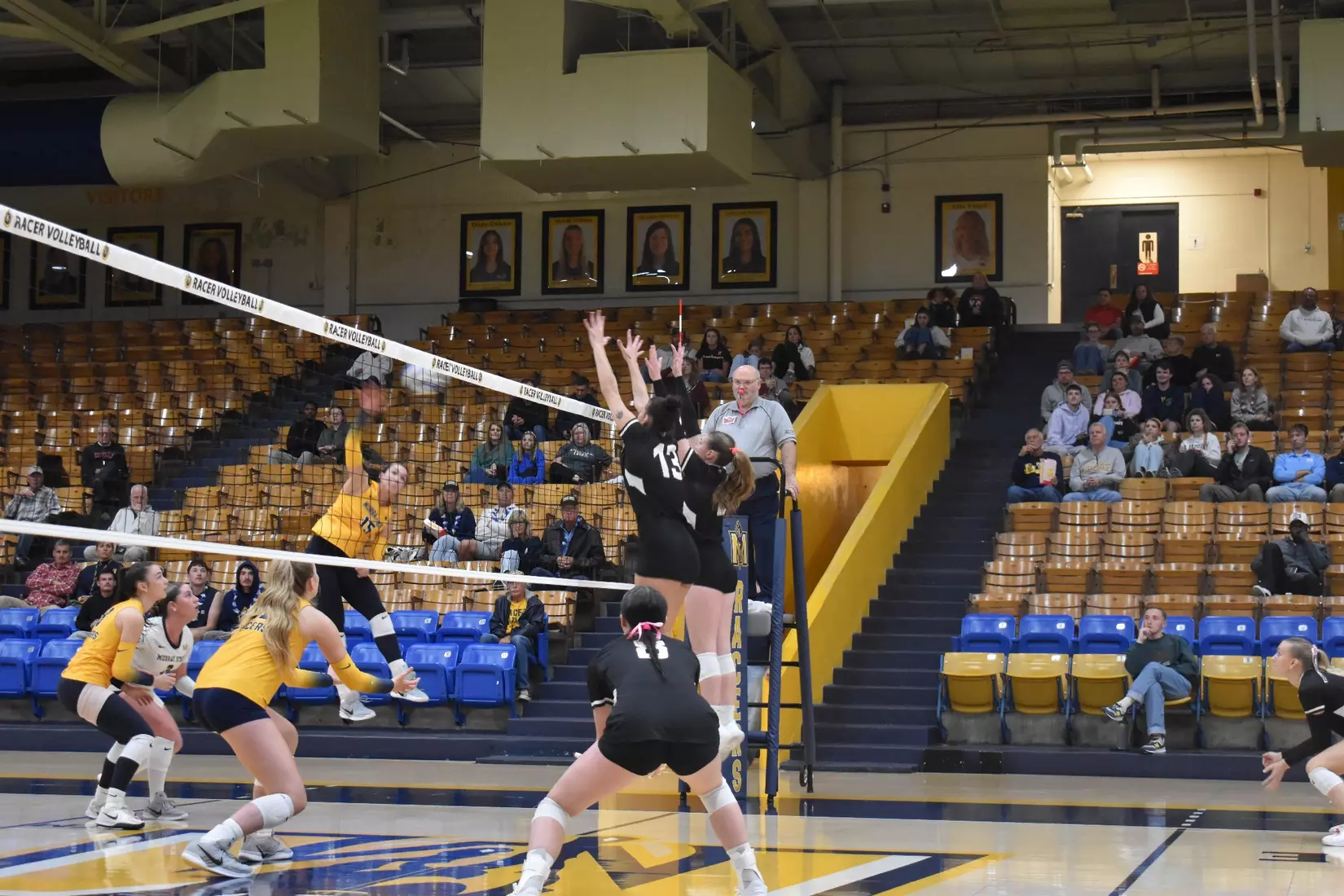 Beatriz Piaia and Natalie Vance go up for a block.