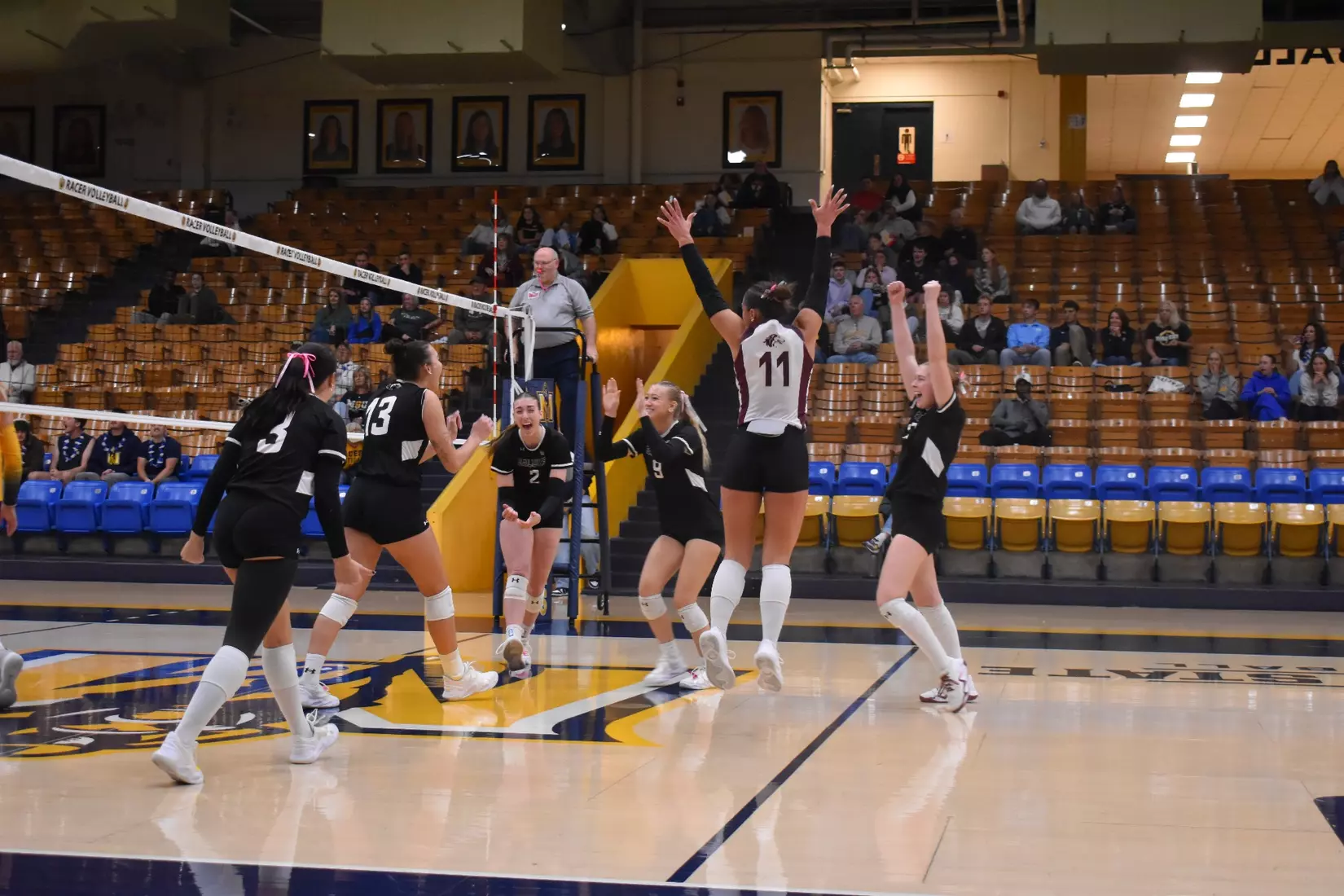 The team celebrates after a point.