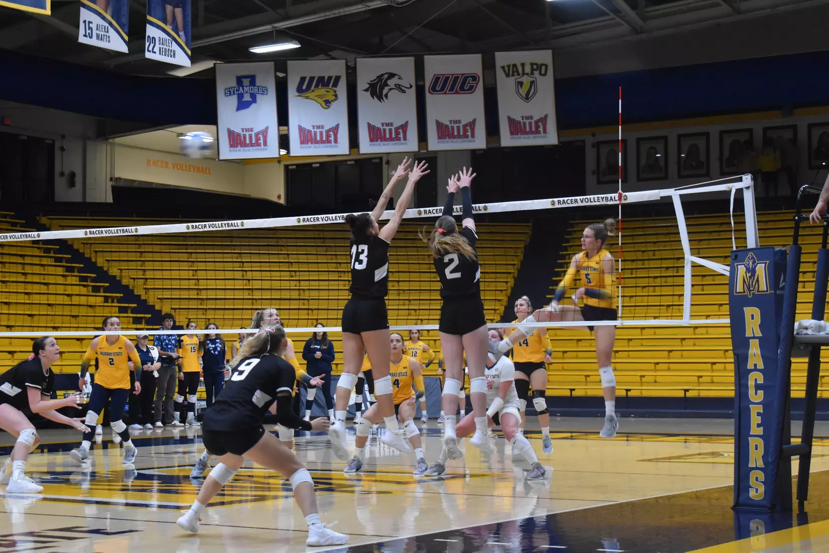 Natalie Vance and Beatriz Piaia go up for a block.