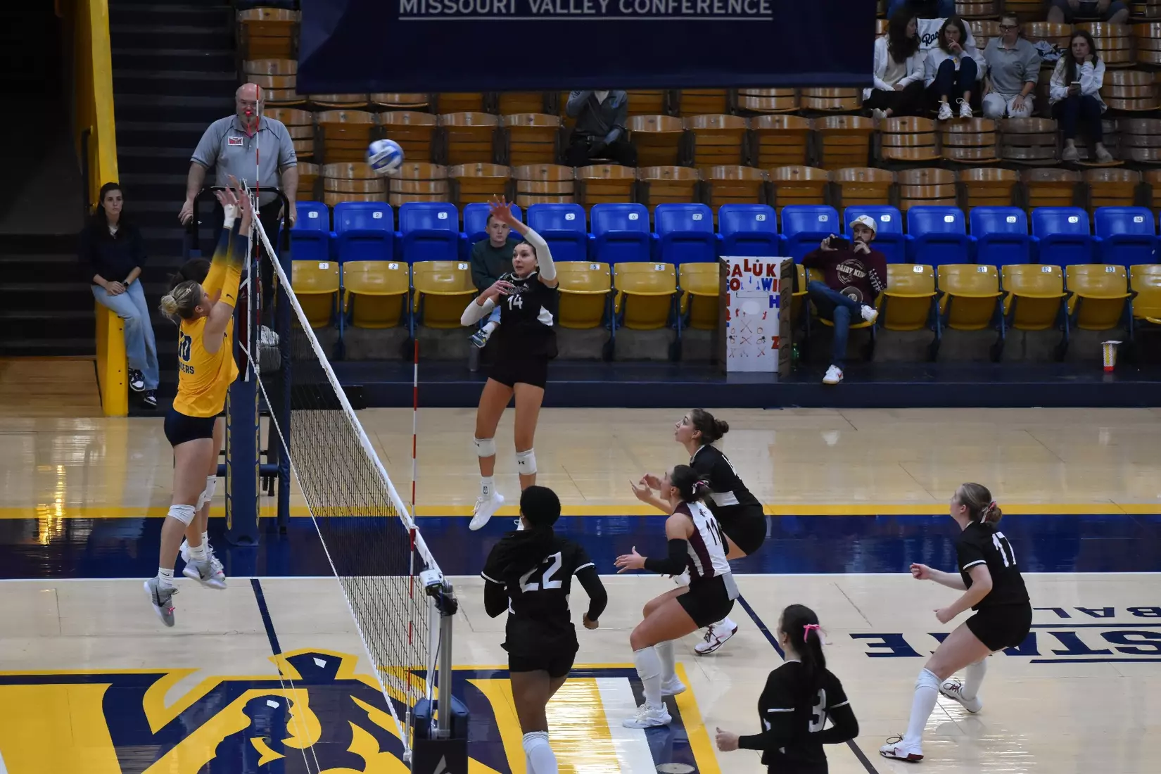 Ella Swansiger attacks a ball.