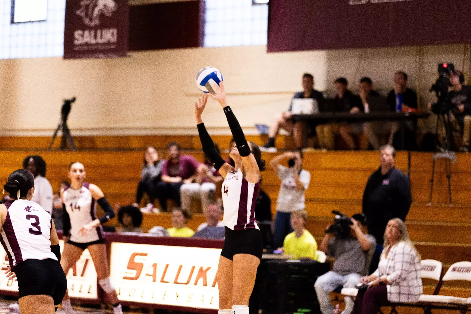 Ella McFarland sets a ball in the match.