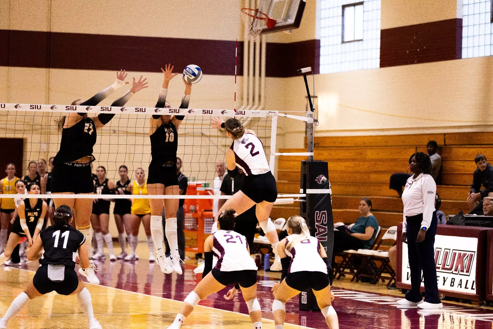 Natalie Vance attacks a ball in the match.