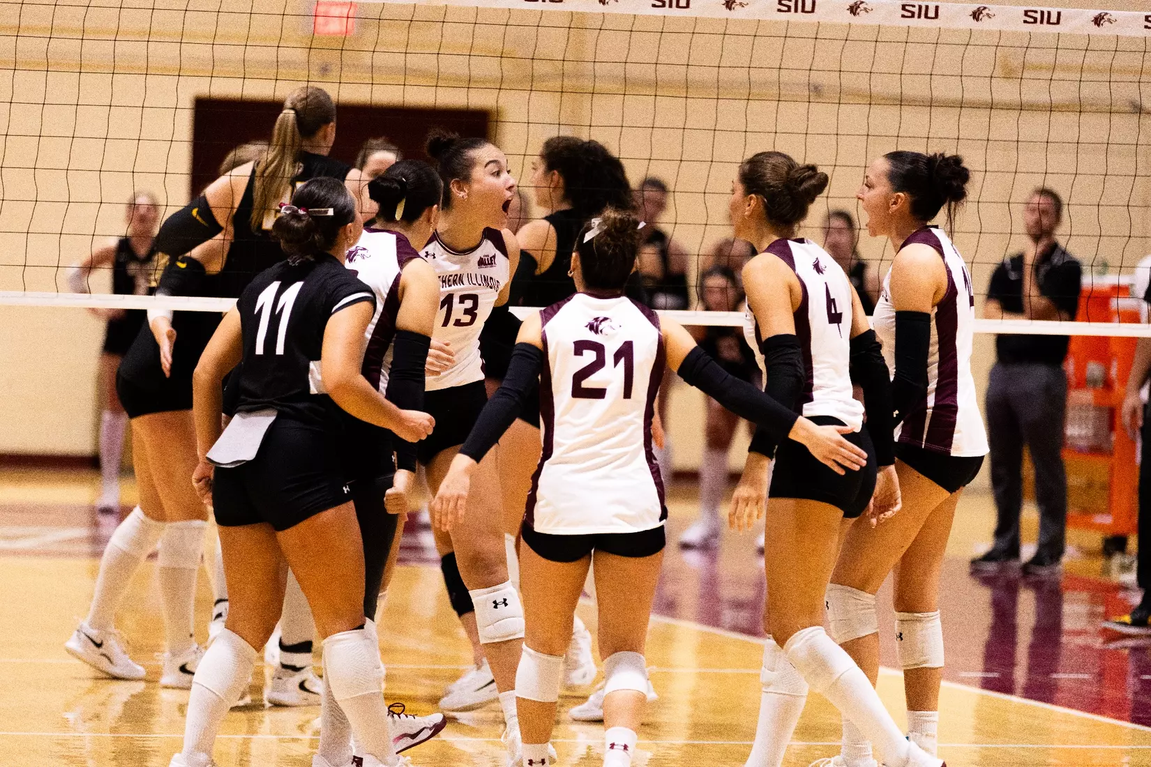 The team celebrates after a point.