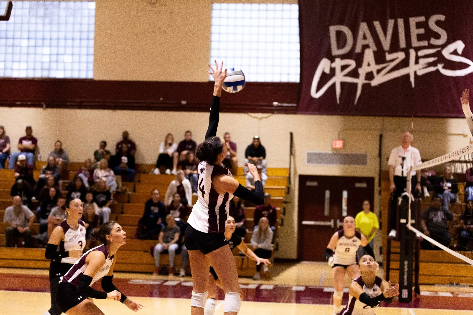 Ella Swansiger attacks a ball in the match.