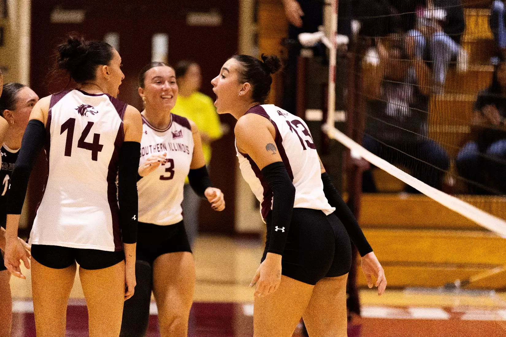 The team celebrates after a point.
