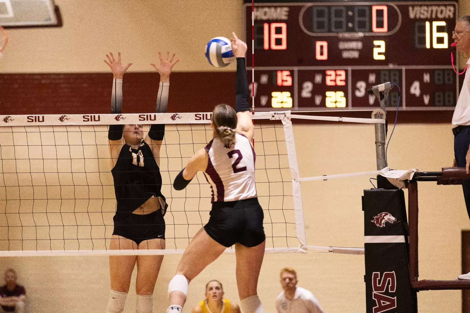 Natalie Vance attacks a ball in the match.
