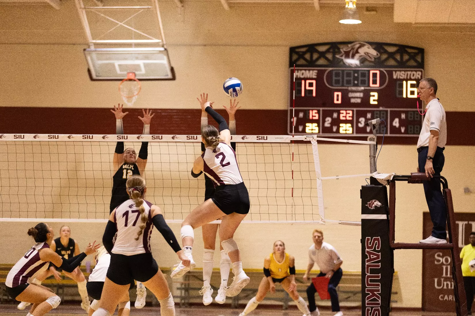 Natalie Vance attacks a ball in the match.