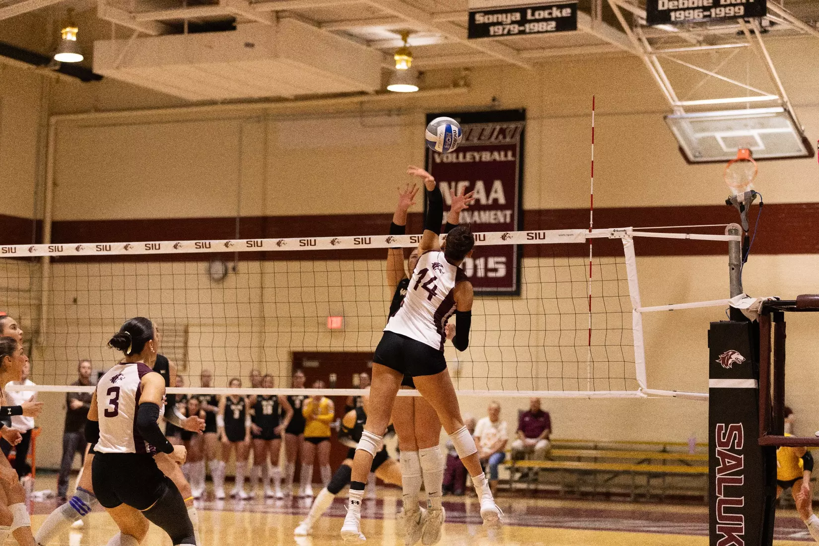 Ella Swansiger attacks a ball in the match.