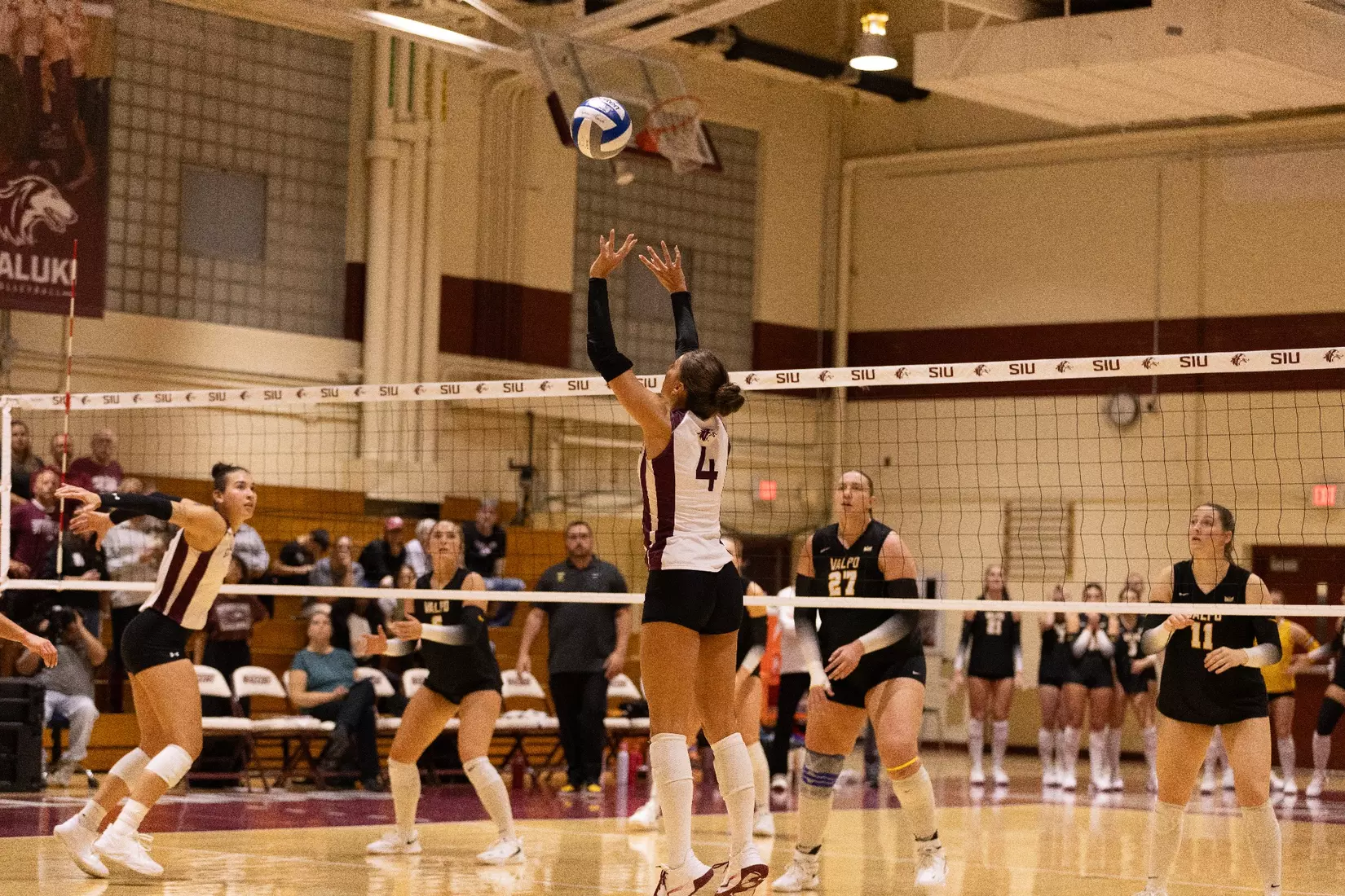 Ella McFarland sets a ball in the match.