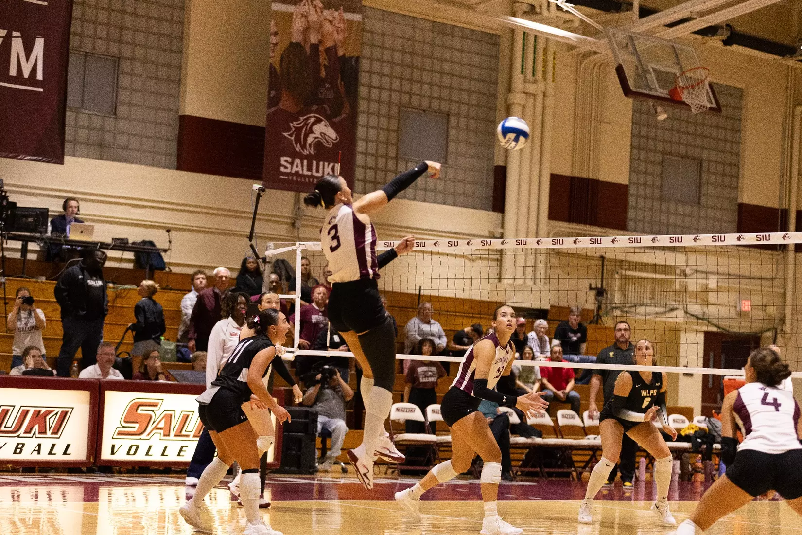 McKenzie Moeller attacks a ball.