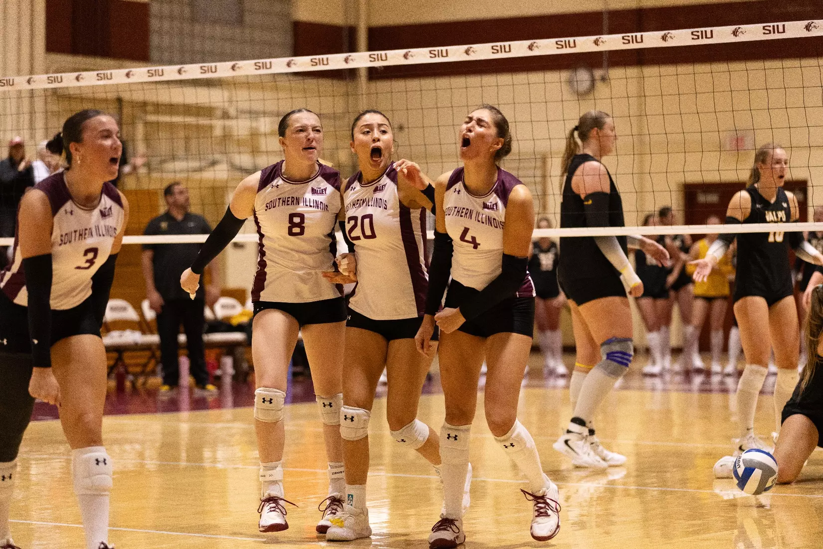 The team celebrates after a point.