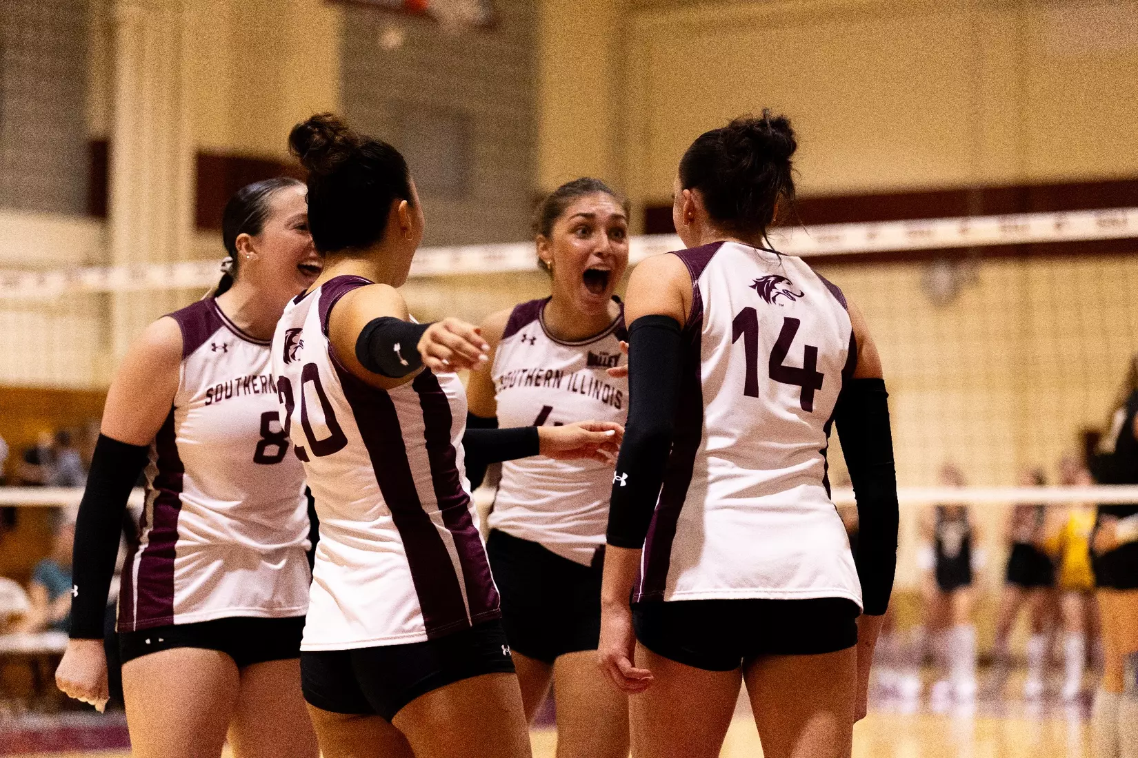 The team celebrates after a point.