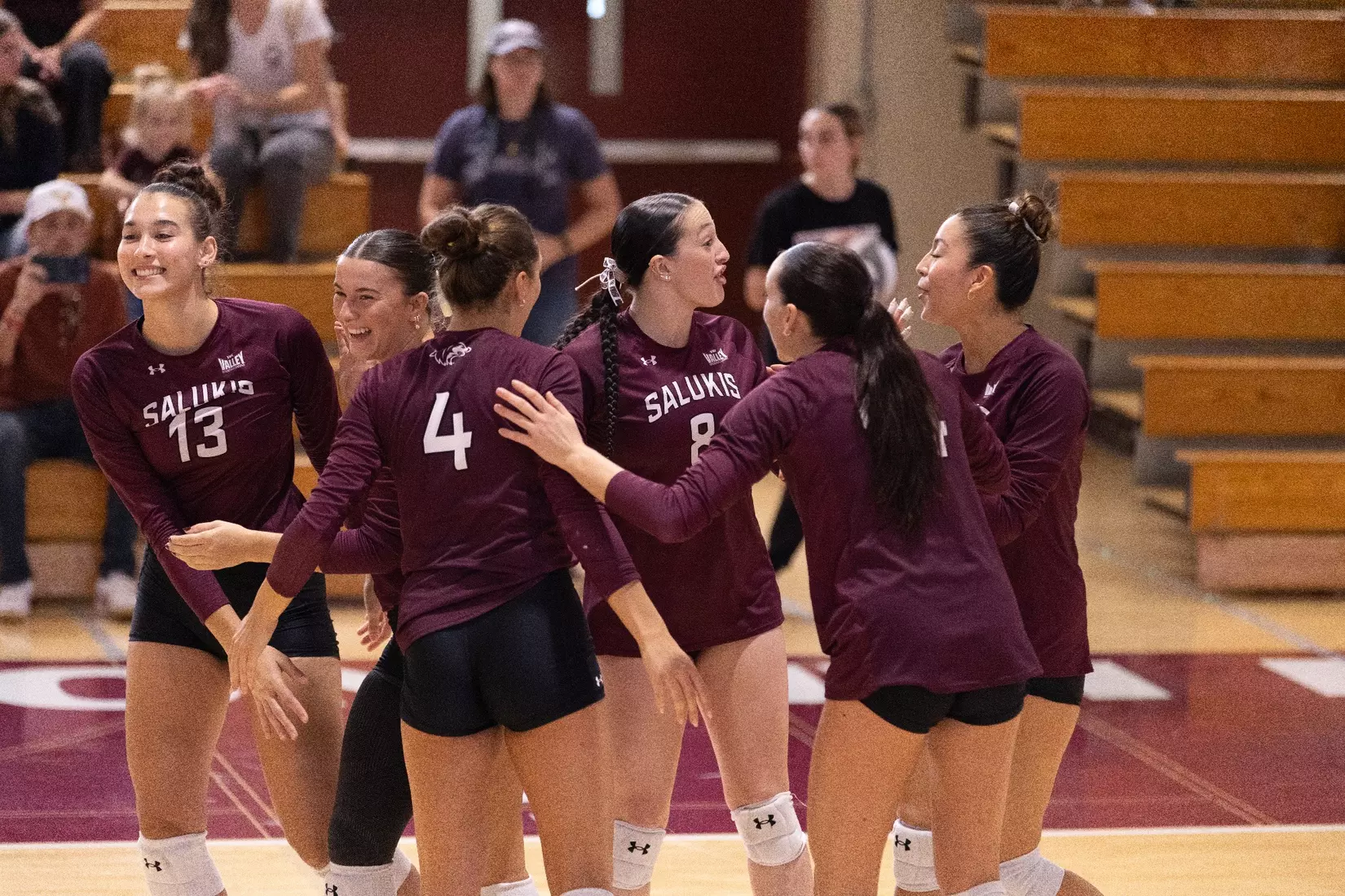 The team celebrates after a point.