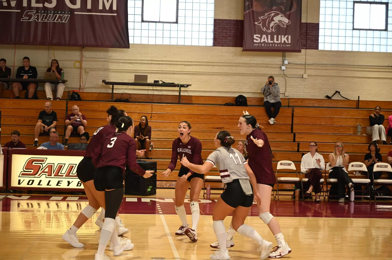 The team celebrates after a point.
