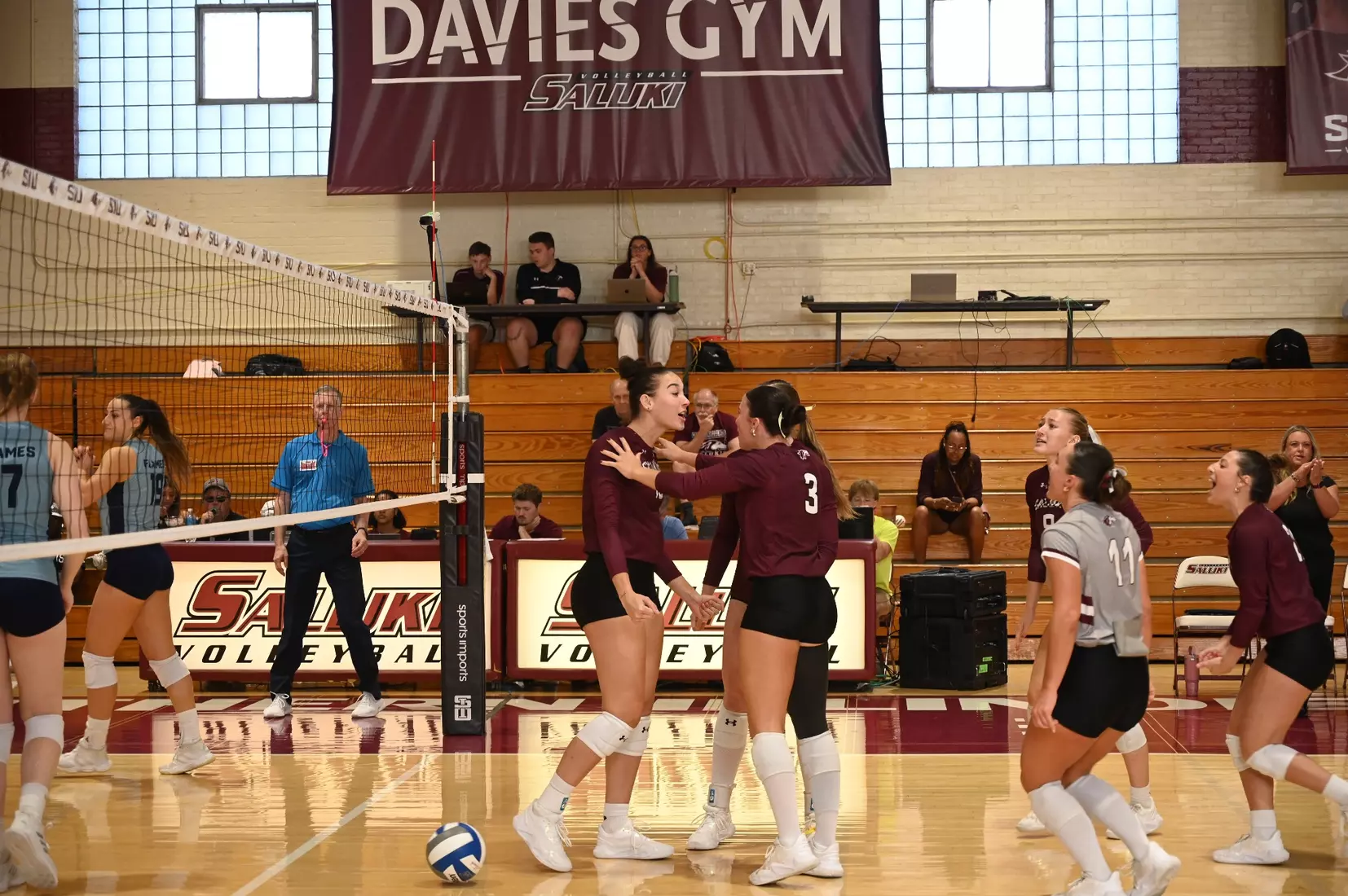 The team celebrates after a point.