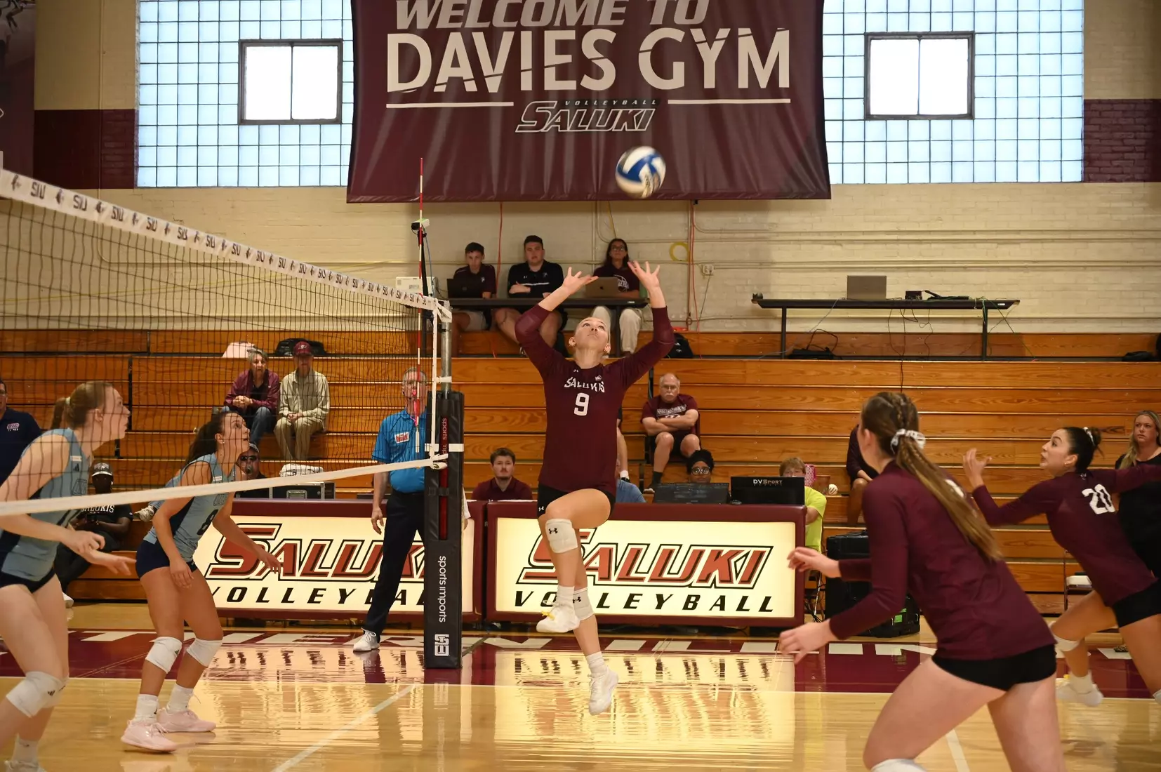 Lillian Dempkey sets a ball.