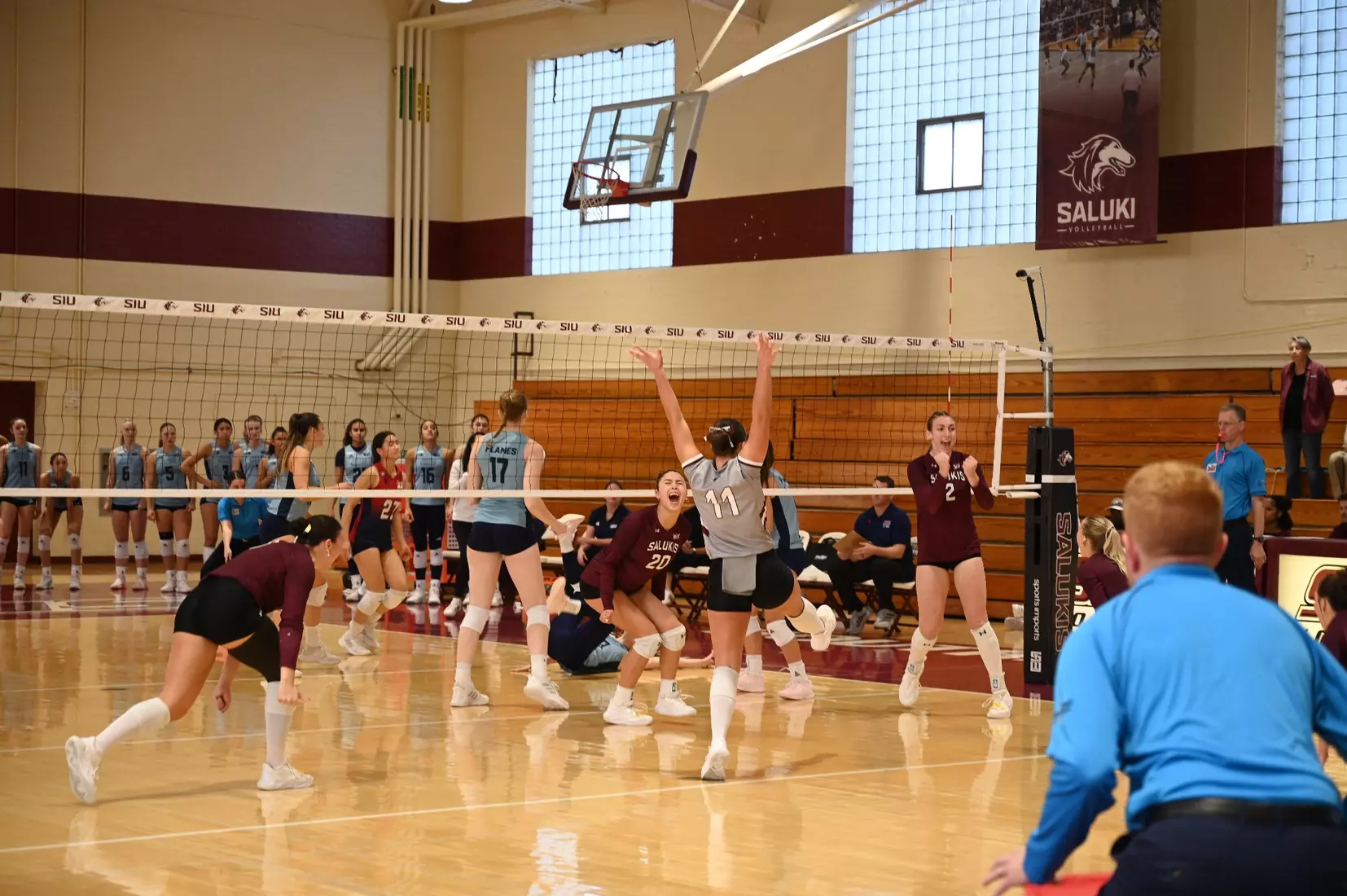 The team celebrates after a point.